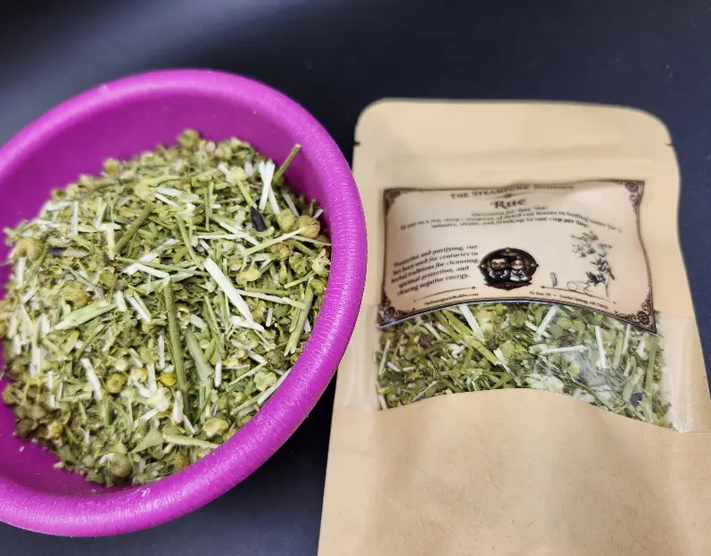 Rue pouch with a bowl of dried rue